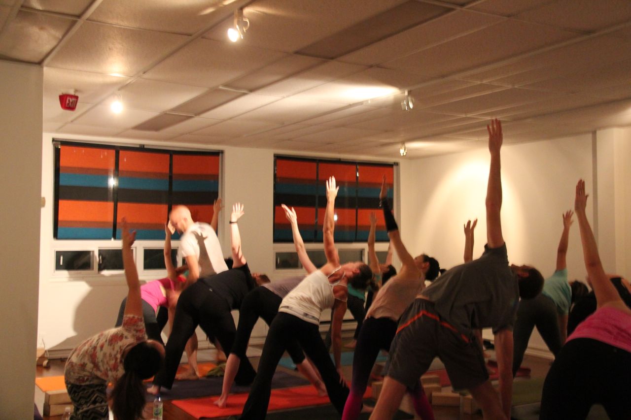A full class at the original Fireflow Yoga studio in midtown Toronto